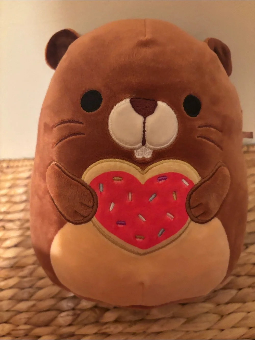 Squishmallows Brown Otter Plush with Red Heart Donut “Chip”